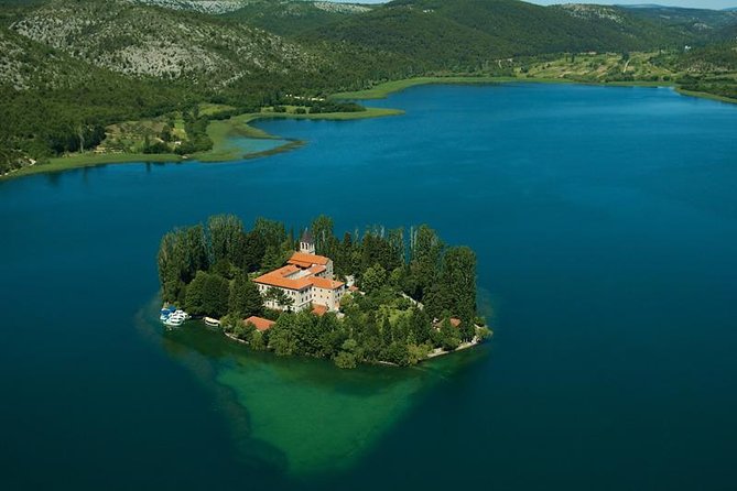 All inclusive luxury Krka waterfalls trip from Split or Trogir. - Visovac Monastery: a short island walk with museum, medieval church, and peacocks
