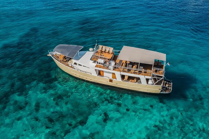 Blue Lagoon and 3 Island Boat Tour with Food and Drinks Included - Island Šolta stop in Nečujam: wrecked ship views and a swim plan