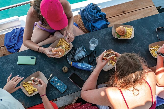 Blue Lagoon and 3 Island Boat Tour with Food and Drinks Included - Drvenik Blue Lagoon: clear water, snorkeling gear, and shade timing