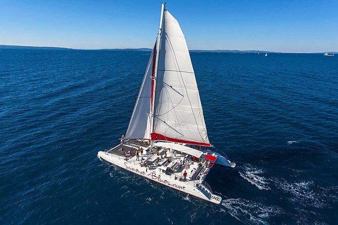 Blue Lagoon, Trogir & Čiovo catamaran tour with Food and Drinks - Stop 1: Blue Lagoon and Krknjasi Bay swim break