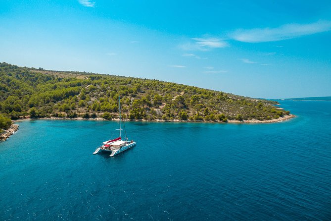 Blue Lagoon, Trogir & Čiovo catamaran tour with Food and Drinks - Stop 3: Čiovo Island and Fumia bay, second swim plus lunch onboard