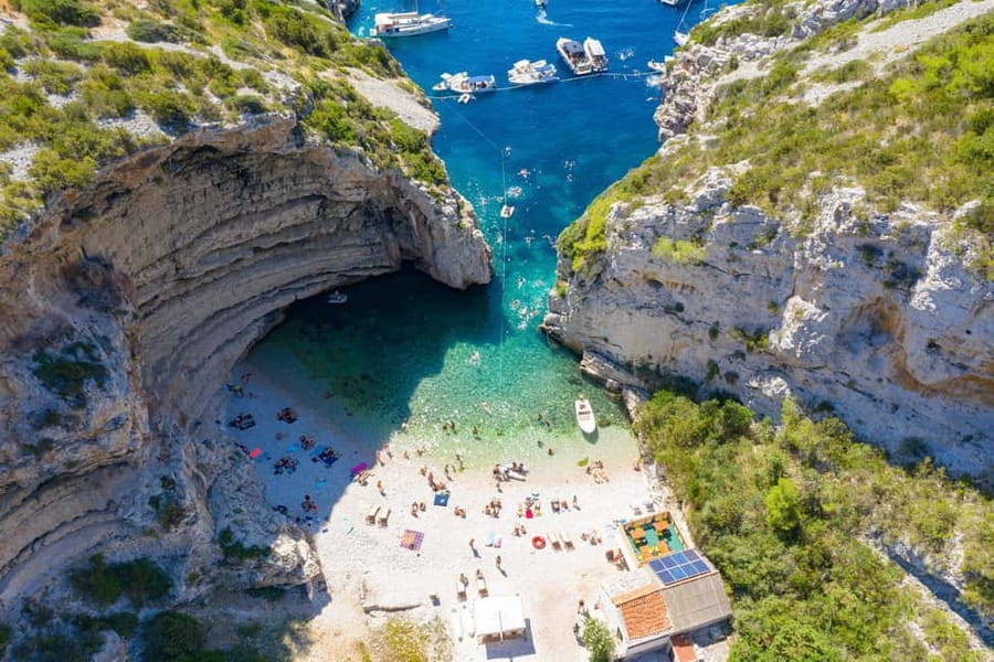 From Hvar: Blue cave group speedboat tour full day - Stiniva Bay: the cove swim that feels more private