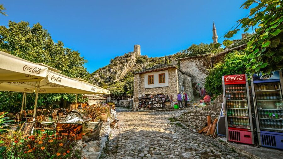 From Split and Trogir: Mostar Tour with Kravica Waterfalls - Mostar on foot: Stari Most, Ottoman quarters, and the restored city feel