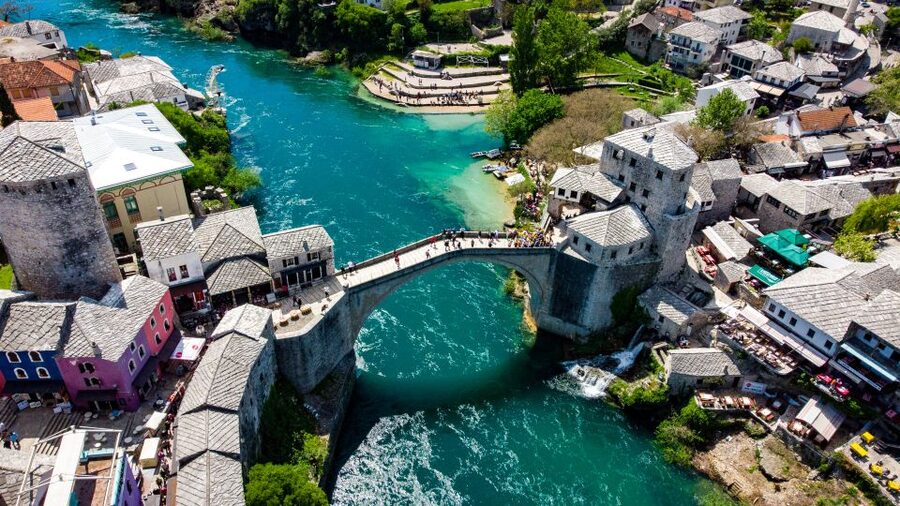 From Split and Trogir: Mostar Tour with Kravica Waterfalls - Early Split pickup, A/C coach comfort, and the road toward Počitelj