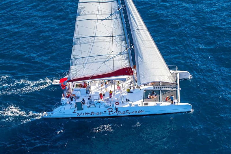 From Split: Catamaran Cruise to Bol, Golden Horn & Brač - All-inclusive drinks, cake, and sunset sailing back to Split