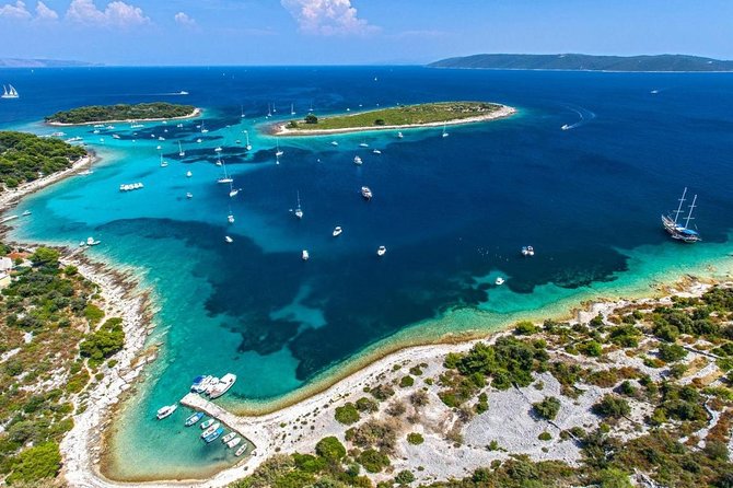 From Split: Half-Day Blue Lagoon and 3 Islands Boat Tour - Stop 1 in Trogir: a fast photo break with coffee options