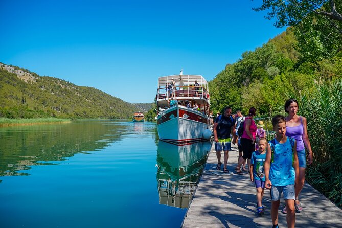 From Split: Krka Waterfalls Trip with Boat Cruise and Swimming - Primošten Beach Time: Swimming Where the Day Turns Relaxed