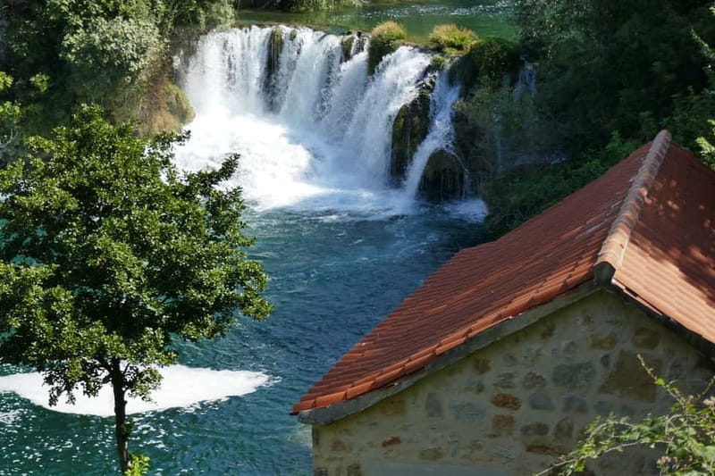 From Split: Krka Waterfalls with Riverboat Ride & swimm stop - Krka National Park time: watermill, Etno village, and the main falls