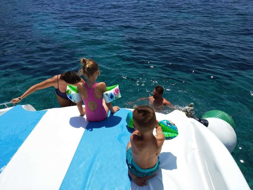 From Split: Luxury Cabin Boat Tour to The Blue Cave and Hvar - On the water to Stiniva and onward: cliffs, curves, and dolphin hopes