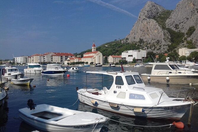 From Split Omis Day Tour with Boat Cruise and Swimming - Boat cruise on the Cetina: time on the water, no rushing