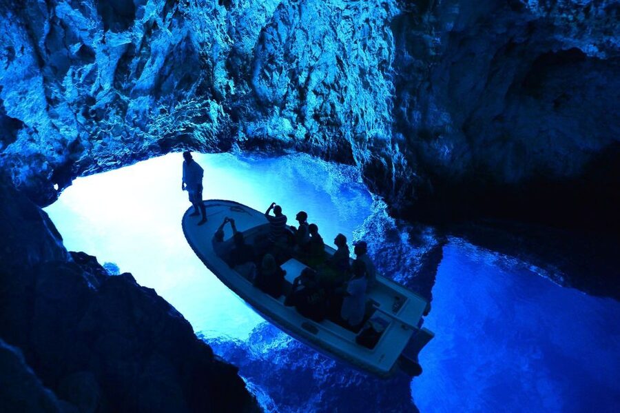 From Split: Private Blue Cave & 5 Islands Snorkeling Cruise - Porat beach on Biševo: sand, cafés, and a real break