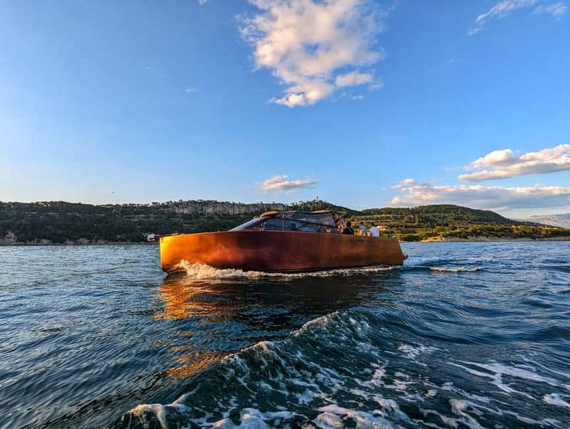From Split: Sunset Powerboat Cruise with Drinks - A slow sunset speedboat ride with real views of Split