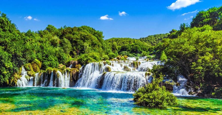 From Split & Trogir: Krka Waterfalls Day Tour with Boat Ride - The Renovated Stone Houses and Watermill Stop