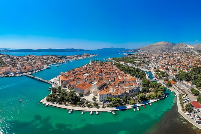 Half Day Tour: Blue Lagoon, UNESCO Town of Trogir, island Ciovo - Blue Lagoon and Krknjaši Bay: swimming, snorkeling, and that sandy-water dream
