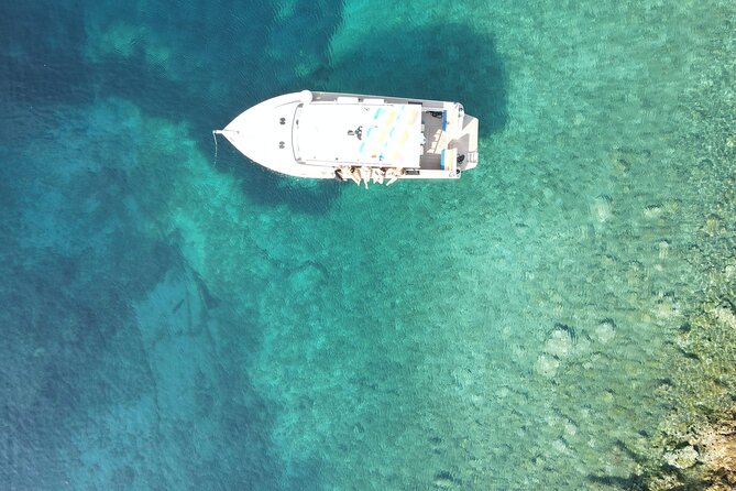 Private Blue Lagoon and Hidden Bays tour from Split & Brac for 12 - Krknjasi Bay Blue Lagoon: Your Main Swim and Snorkel Moment