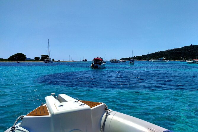 Private boat tour to Blue Lagoon & 4 Islands - Vela Rina Beach: natural cove swimming with a camera-friendly payoff