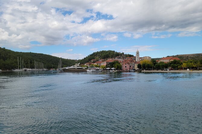 Private Krka Waterfalls Tour from Split with Boat Ride & Detour - Skradin stop: a short town stretch and a solid meal option