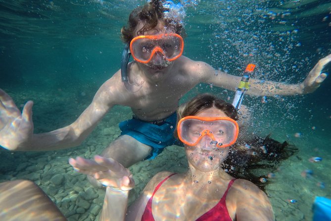Private Sea Kayaking & Snorkeling Tour in Split - Getting geared up: sit-on-top kayaks and snorkel-ready comfort