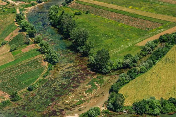 Sinj: Panoramic Flight over Peruca Lake and Dinara mountain - Vrlika field, Peruća dam, and a landing line following the Cetina River