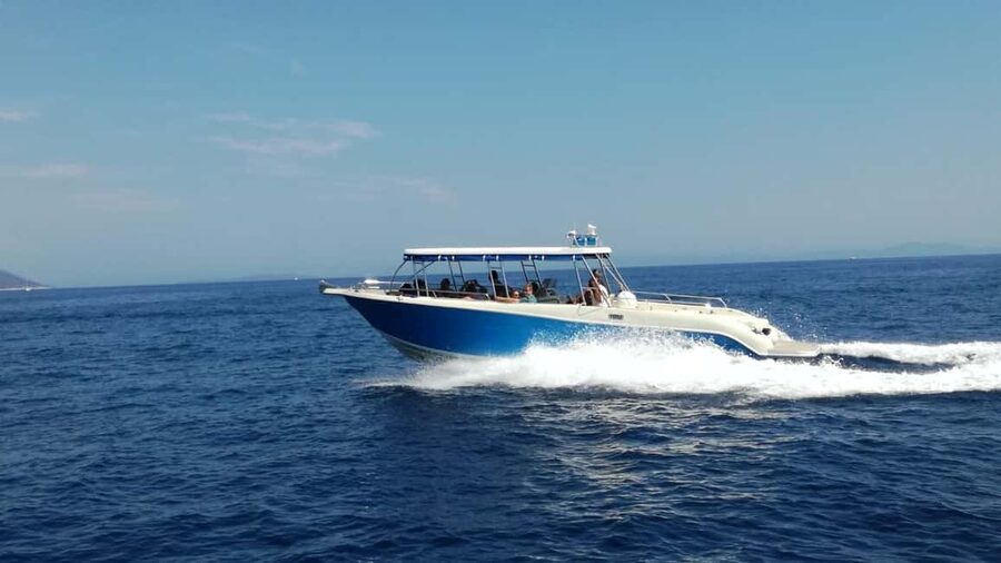 Split: Blue Cave, Hvar, and Pakleni Islands Speedboat Tour - Stiniva Cove on Vis, cliffs that make a swim sanctuary