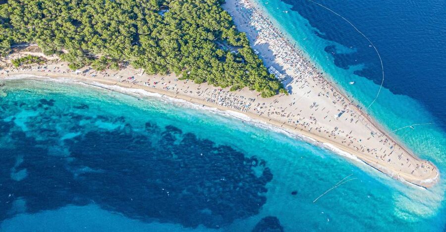 Split: Day Trip to Hvar & Brač Islands with Zlatni Rat Beach - First Impressions: A Day of Sun, Rock, and Tunnels