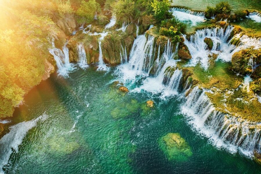 Split: Krka Waterfalls Trip with Boat Cruise and Swimming - Primošten after Krka: swim on the pebble beach or wander old streets