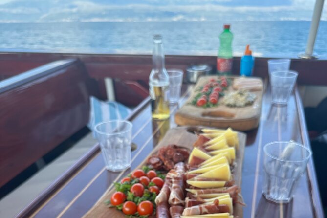 Split private boat tour for a groups up to 42 people - Lunch time on Brac: unlimited water, wine, and orange juice